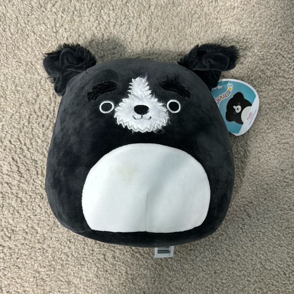 Paulie the Black Dog Squishmallow with tag 8”.
(small stain)